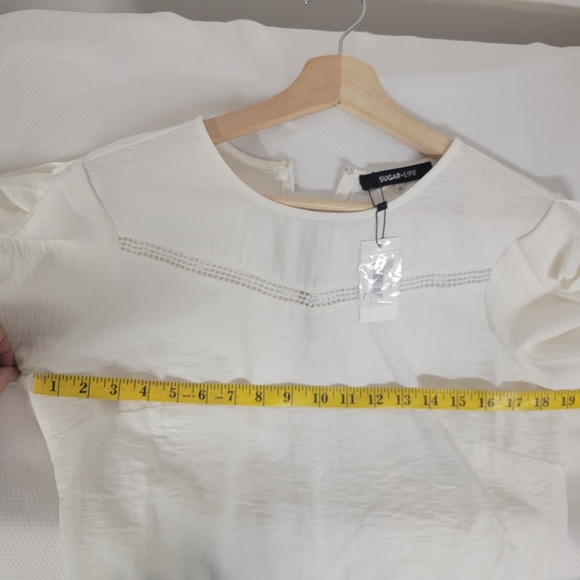 NWT Sugar + Lips Crochet Trim Puff sleeve white zip-up blouse top, size Large - Picture 9 of 11